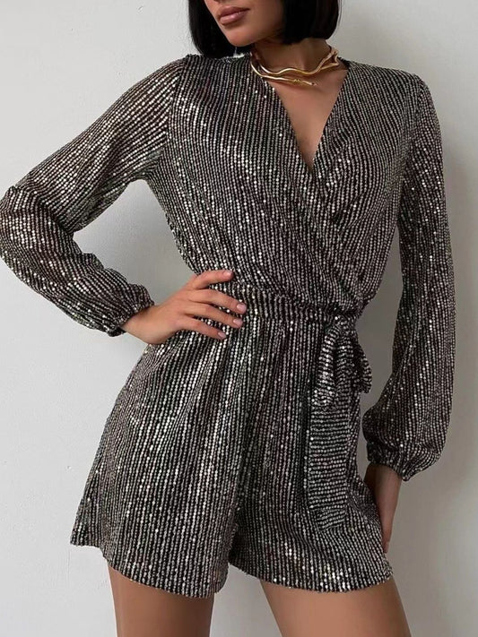 Full Size Sequin Surplice Tie Waist Long Sleeve Romper Trendsi