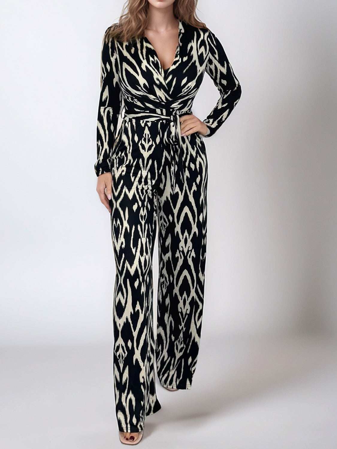 Full Size Leopard Tie Waist Long Sleeve Jumpsuit Plus Size Trendsi